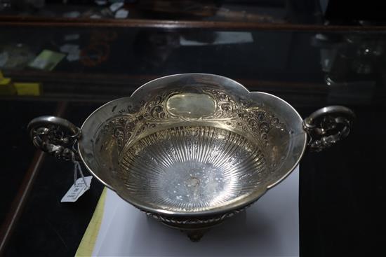 A late Victorian embossed silver two-handled shaped oval bowl, London, 1900, 18.5 oz.